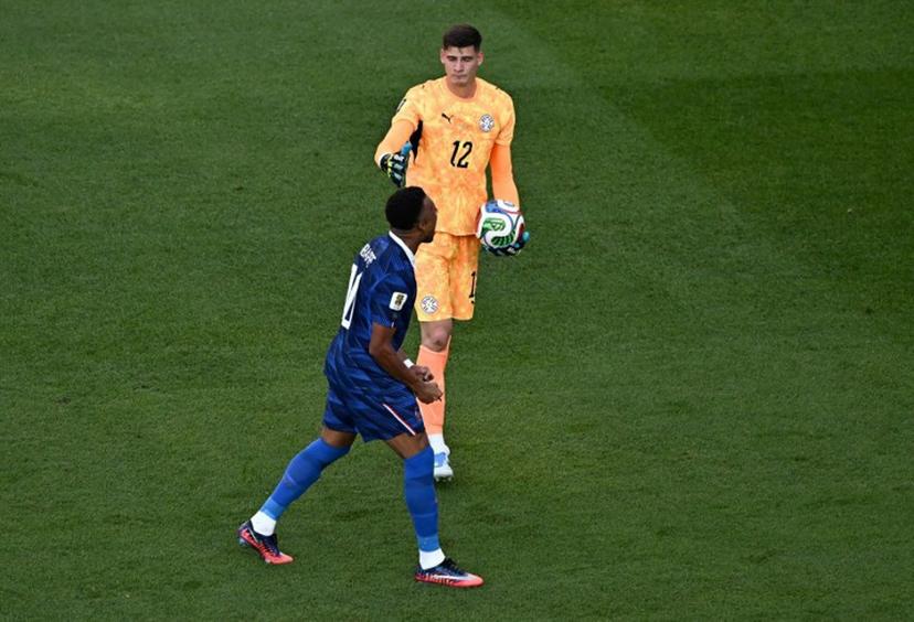 France's forward #10 Kylian Mbappe celebrates next to Paraguay's goalkeeper #12 Orlando Gill after winning the 2026 World Cup round of 16 football match between Paraguay and France at the Philadelphia Stadium in Philadelphia on July 4, 2026. Jewel SAMAD / AFP