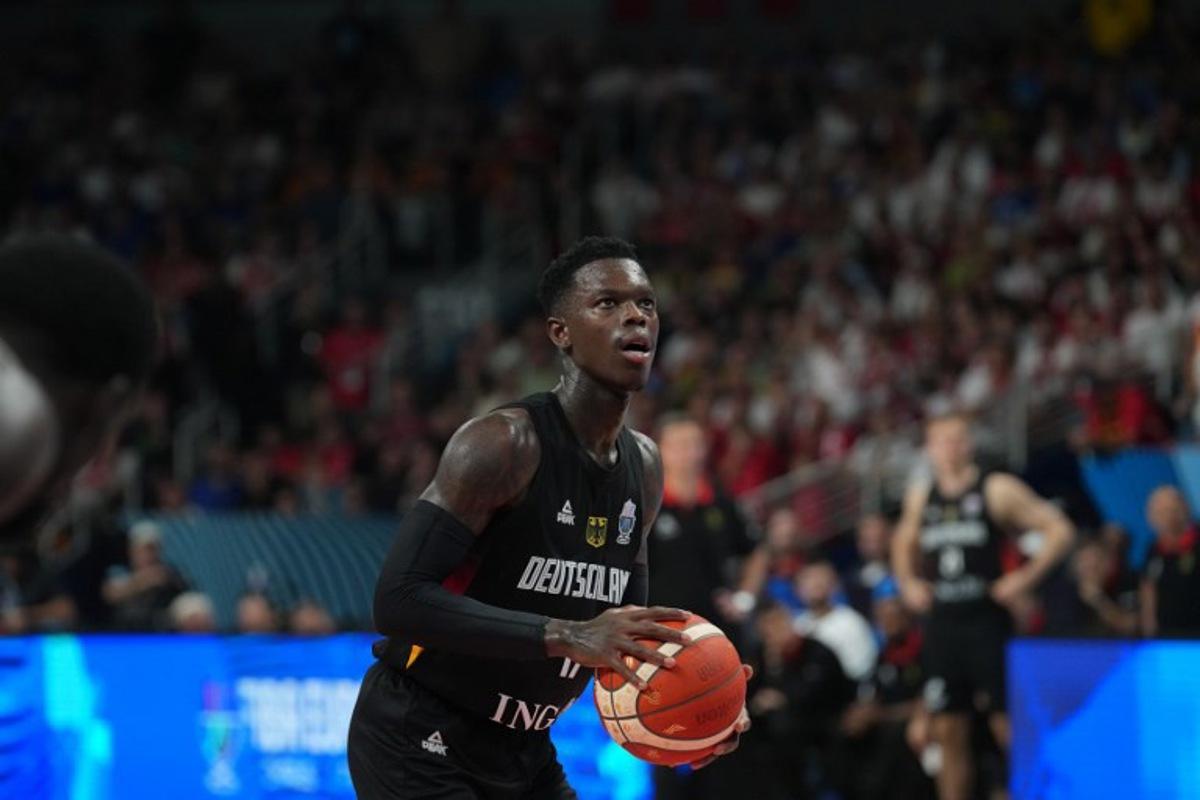Germany's point guard #17 Dennis Schroder prepares for a throw during the FIBA EuroBasket 2025 final basketball match between Turkey and Germany in Riga, Latvia, on September 12, 2025. Gints Ivuskans / AFP