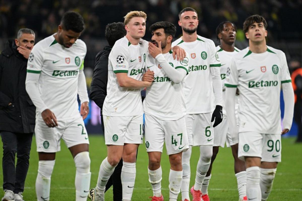 Sporting players react after the UEFA Champions League second-leg knockout round play-off football match BVB Borussia Dortmund vs Sporting CP at the Signal Iduna stadium in Dortmund, western Germany, on February 19, 2025. UWE KRAFT / AFP