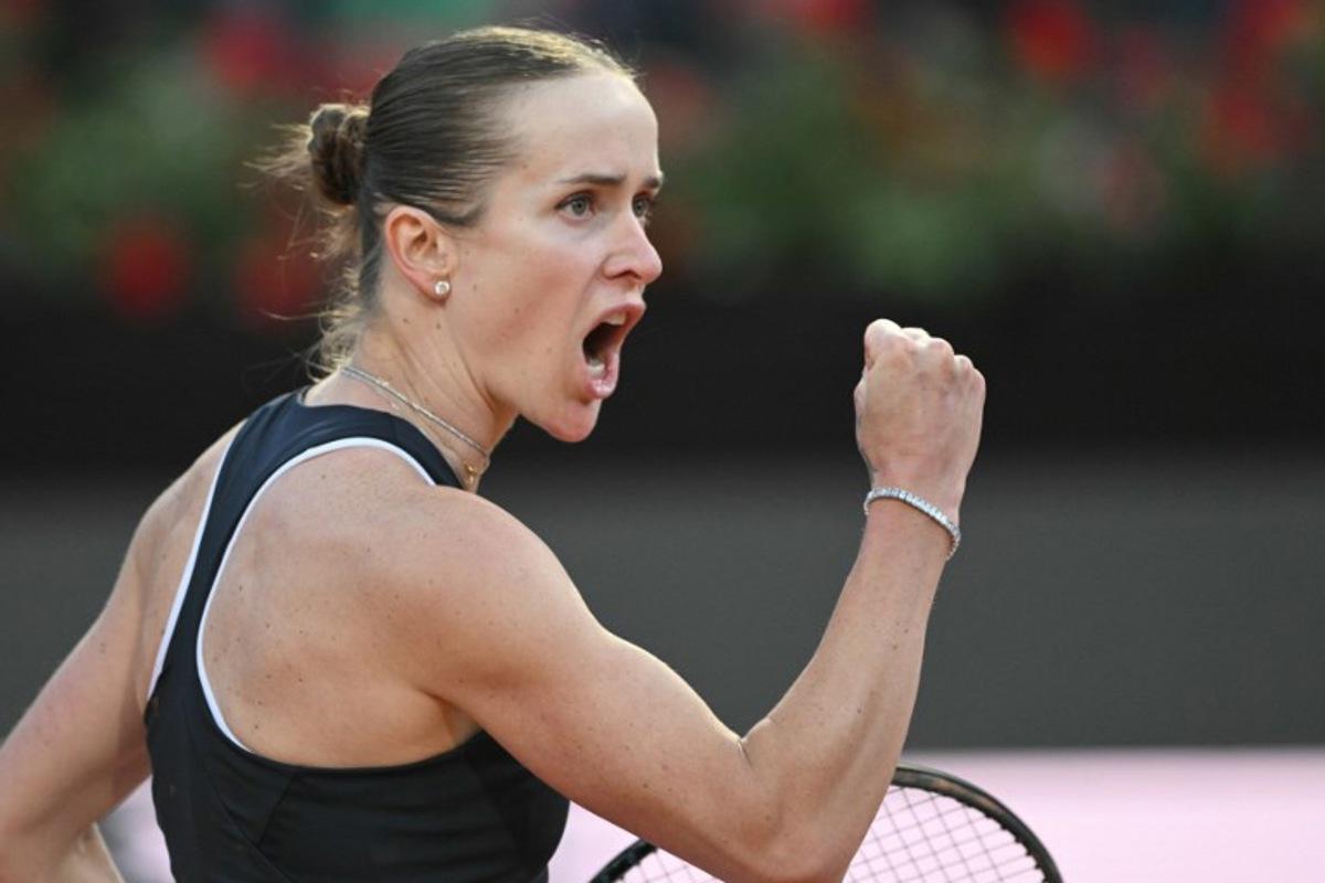 Ukraine's Elina Svitolina celebrates a point against USA's Coco Gauff during the WTA Rome Open tennis tournament final at Foro Italico in Rome on May 16, 2026. Tiziana FABI / AFP