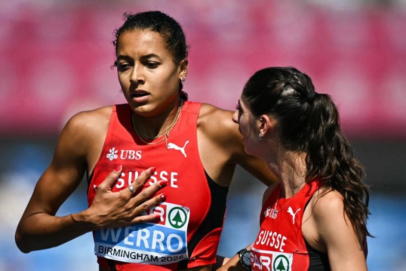 Switzerland's Audrey Werro (L) reacts after competing and falling in the women's 800m semi-final 1 during the European Athletics Championships at Alexander Stadium in Birmingham on August 13, 2026. Paul ELLIS / AFP