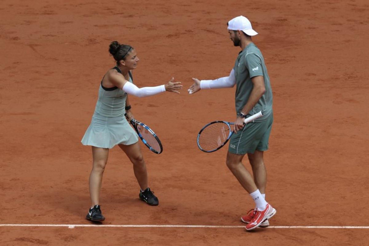 Italy's Sara Errani (L) and Italy's Andrea Vavassori reacts to a point against Canada's Gabriela Dabrowski and US Evan King during their mixed doubles final match on day 12 of the French Open tennis tournament on Court Philippe-Chatrier at the Roland-Garros Complex in Paris on June 4, 2026. Thomas SAMSON / AFP