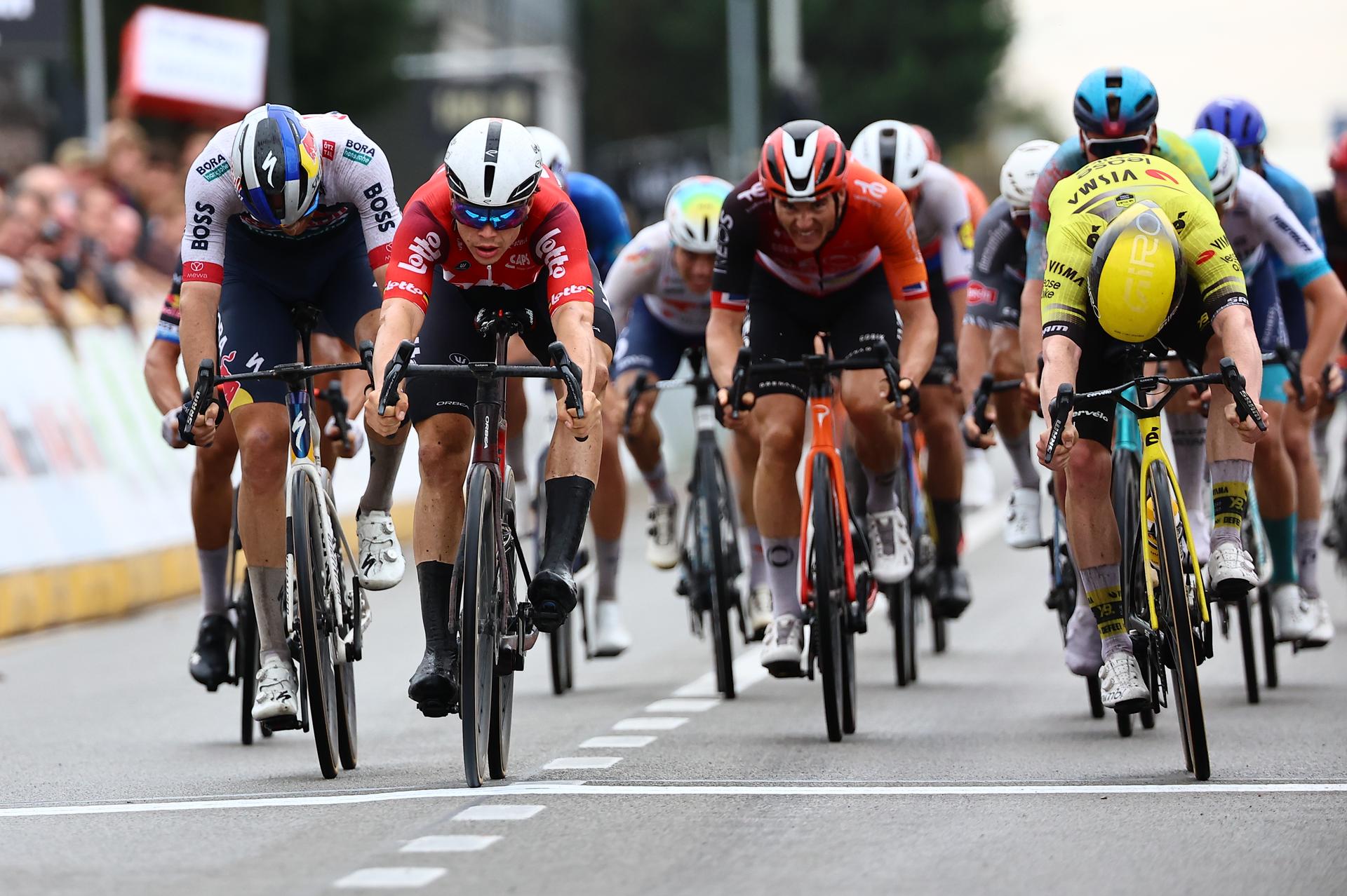 Belgian Jordi Meeus of RedBull-BORA-hansgrohe, Belgian Arnaud De Lie of Lotto Cycling Team and British James Matthew Brennan of Team Visma-Lease a Bike sprint to the finish of the Super 8 Classic one day cycling race 200,7km from Brakel to Boortmeerbeek, on Saturday 20 September 2025. BELGA PHOTO DAVID PINTENS