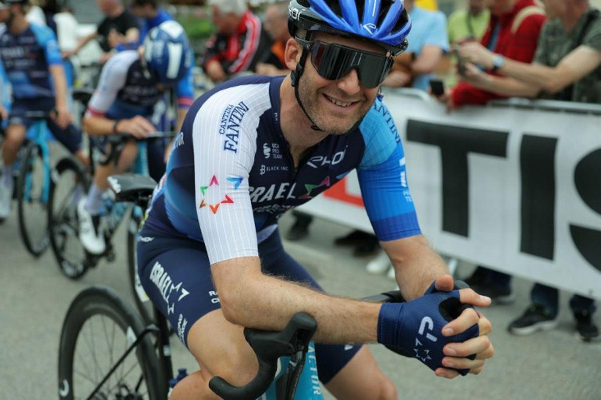 Team Israel Premier Tech's Canadian rider Hugo Houle waits for the start of the sixth stage of the 76th edition of the Criterium du Dauphine cycling race in Hauterives, on June 7, 2024. Thomas SAMSON / AFP
