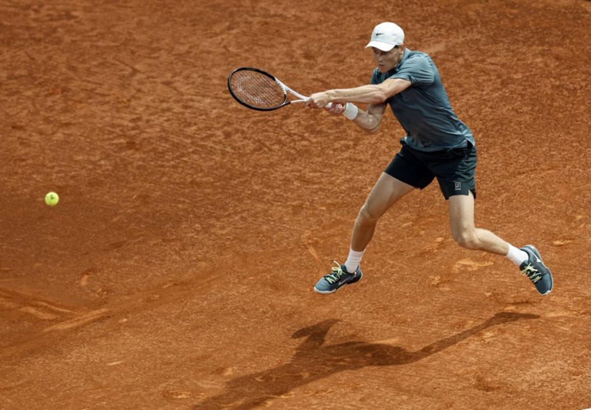 Italy's Jannik Sinner returns a ball to Spain's Rafael Jodar during their 2026 ATP Tour Madrid Open tennis tournament quarterfinal singles match at the Caja Magica in Madrid, on April 29, 2026. OSCAR DEL POZO / AFP