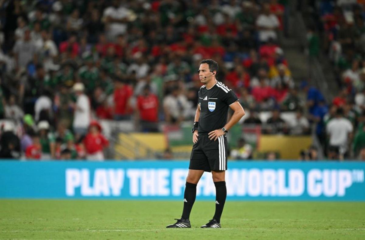 Argentine referee Facundo Tello officiates during the 2026 World Cup Group A football match between South Africa and South Korea at the Monterrey Stadium in Guadalupe, Mexico, on June 24, 2026. Yuri CORTEZ / AFP