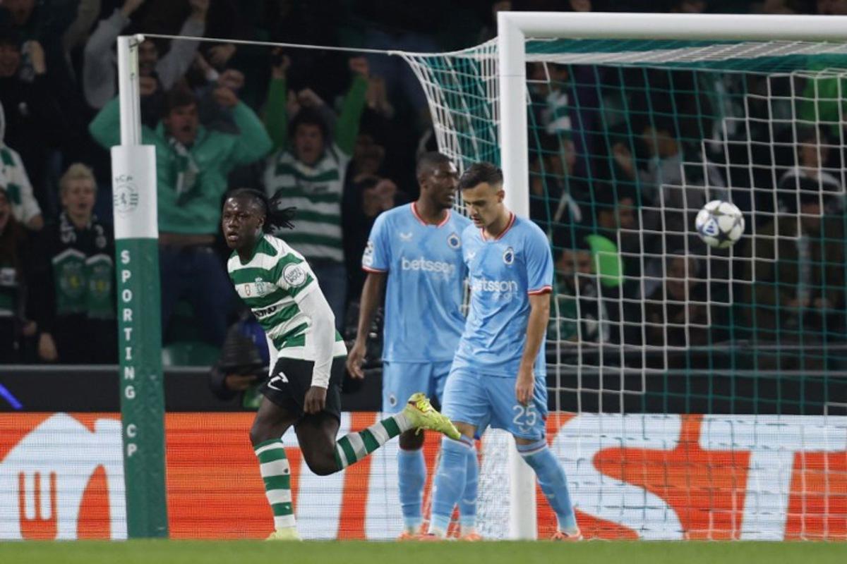 Sporting Lisbon's Portuguese midfielder #07 Geovany Quenda (L) celebrates scoring the opening goal during the UEFA Champions League, league phase day 5 football match between Sporting CP and Club Brugge at Jose Alvalade stadium in Lisbon on November 26, 2025. FILIPE AMORIM / AFP