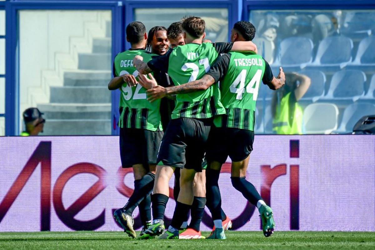Sassuolo's French forward #45 Armand Lauriente (2nd-L) celebrates scoring his team's third goal during the Italian Serie A football match between Unione Sportiva Sassuolo and AC Milan at the Mapei Stadium in Reggio Emilia, on April 14, 2024. Piero CRUCIATTI / AFP