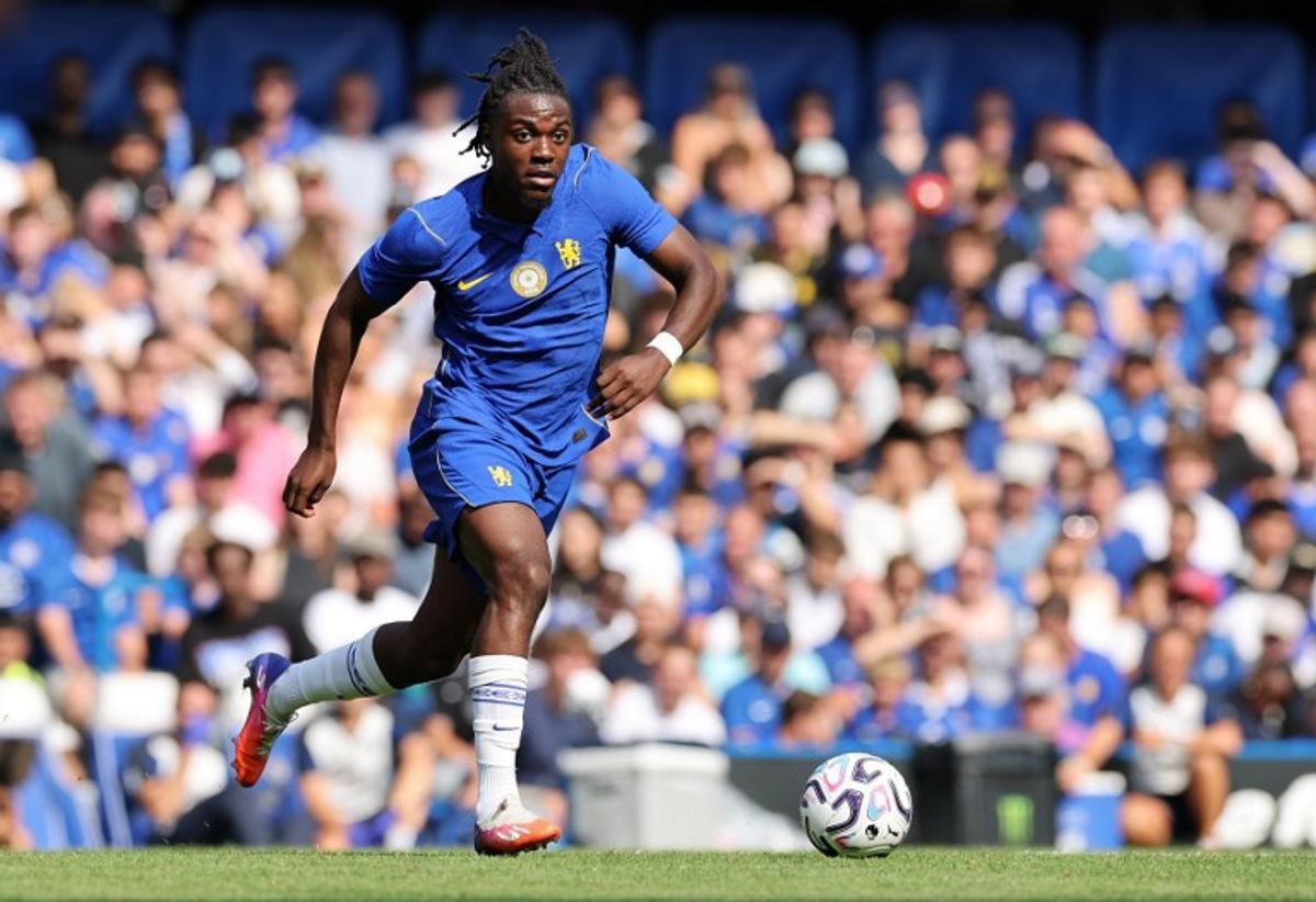 Chelsea's Belgian midfielder #45 Romeo Lavia runs with the ball during the pre-season friendly football match between Chelsea and Real Sociedad at Stamford Bridge in London on August 15, 2026. Adrian DENNIS / AFP