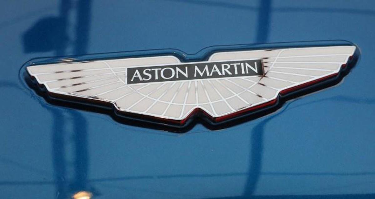 The logo on an Aston Martin Vanquish S is displayed at The International Automobile Festival in Paris on January 31, 2018. JACQUES DEMARTHON / AFP