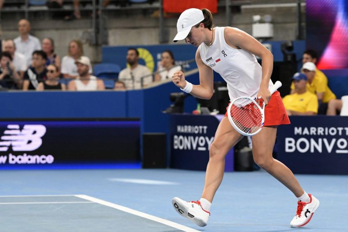 Poland's Iga Swiatek reacts on a point against Australia's Maya Joint during their women's singles quarter-final match at the United Cup at Ken Rosewall Arena in Sydney on January 9, 2026. Izhar KHAN / AFP
