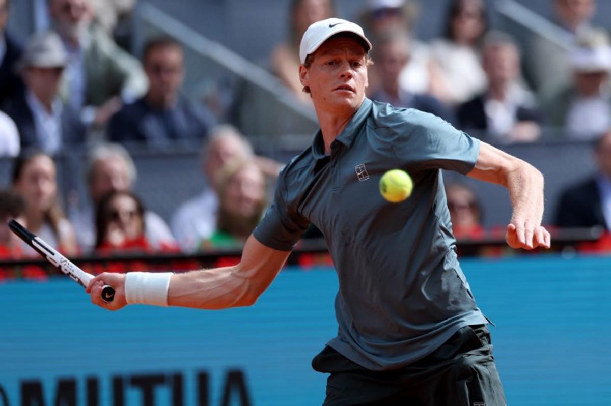 Italy's Jannik Sinner returns a ball to Germany's Alexander Zverev during the 2026 ATP Tour Madrid Open tennis tournament final singles match at the Caja Magica in Madrid, on May 3, 2026. Thomas COEX / AFP