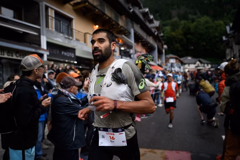US trailer Ben Dhiman competes in the 22nd edition of the Ultra Trail du Mont Blanc (UTMB), a 174km trail race crossing France, Italy and Switzerland, in Chamonix, south-eastern France on August 29, 2025. JEFF PACHOUD / AFP