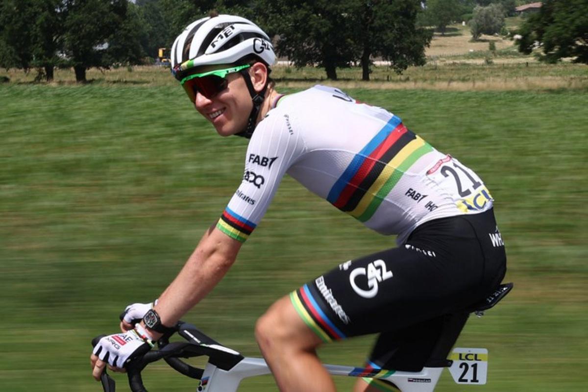UAE Team Emirates XRG's Slovenian rider Tadej Pogačar reacts as he cycles during the 5th stage of the 77th edition of the Criterium du Dauphine cycling race, 183 km between Saint-Priest and Mâcon, on June 12, 2025. Anne-Christine POUJOULAT / AFP