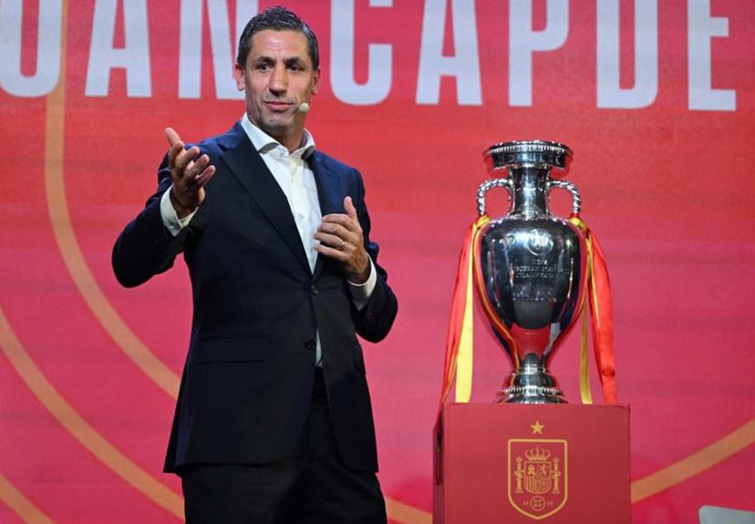Former Spain's player Joan Capdevila poses next to Henri Delaunay cup, the trophy of the UEFA European Football Championship, during the unveiling of Euro 2024 squad on May 27, 2024 at the Ciudad del Futbol training facilities in Las Rozas de Madrid. JAVIER SORIANO / AFP