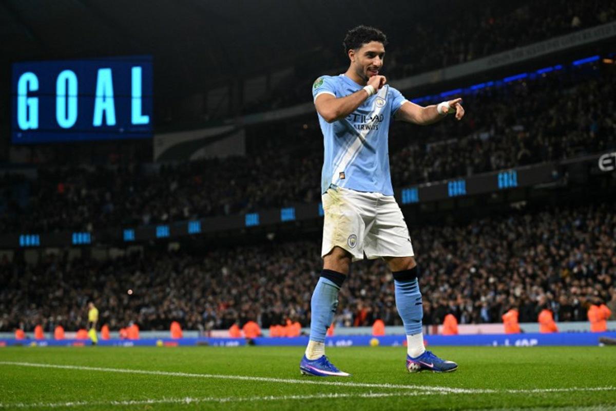 Manchester City's Egyptian striker #07 Omar Marmoush celebrates scoring the team's second goal during the English League Cup semi final second leg football match between Manchester City and Newcastle United at the Etihad stadium in Manchester, northwest England on February 4, 2026. Oli SCARFF / AFP