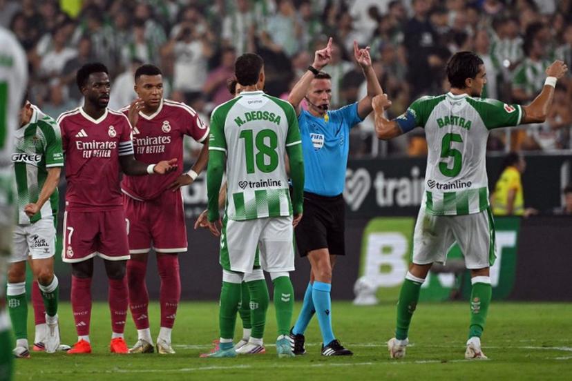 Spanish referee Alejandro Hernandez signals offside and disallows the goal scored by Real Madrid's Spanish forward #19 Carlos Espi Escrihuela during the Spanish league football match between Real Betis and Real Madrid CF at Benito Villamarin Stadium in Seville on September 4, 2026. JORGE GUERRERO / AFP