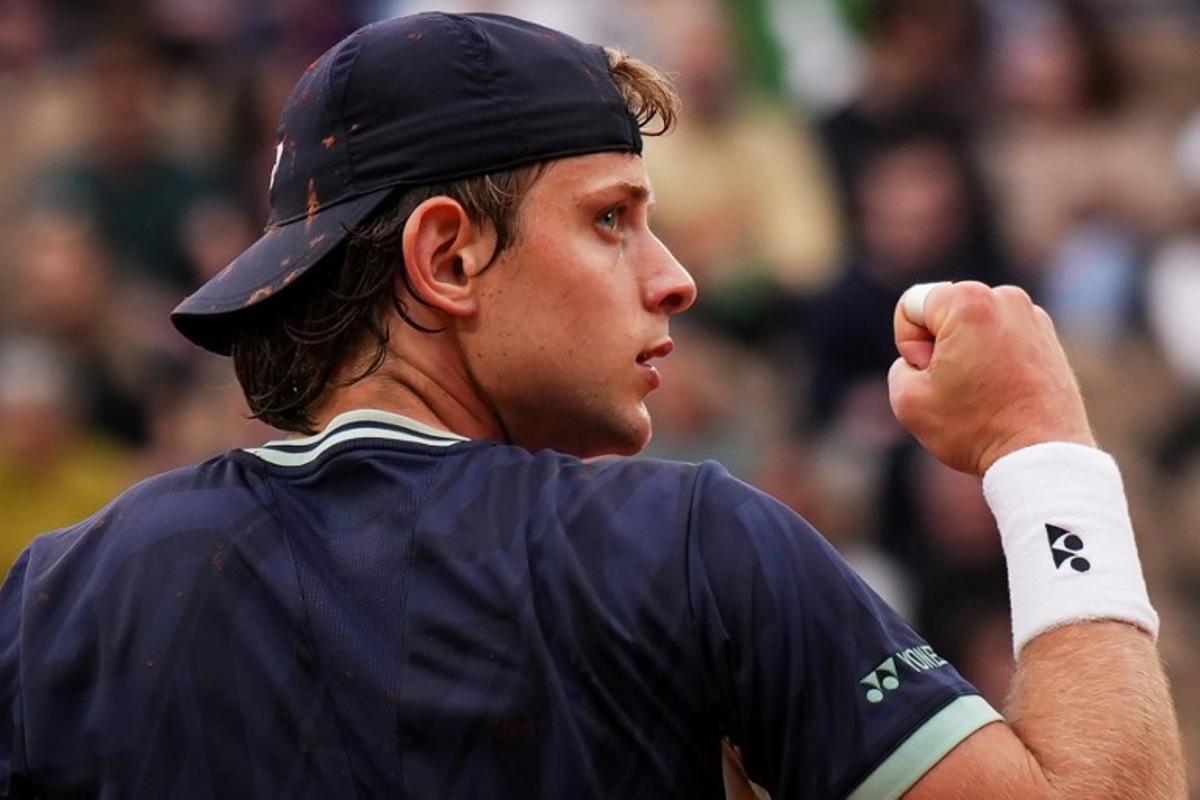Belgium's Zizou Bergs reacts during his men's singles match against France's Giovanni Mpetshi Perricard on day 1 of the French Open tennis tournament on Court Suzanne-Lenglen at the Roland-Garros Complex in Paris on May 25, 2025. Dimitar DILKOFF / AFP