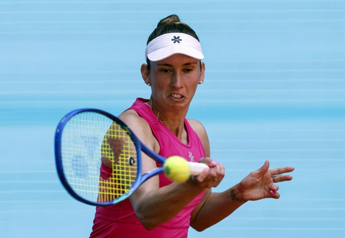 Belgium's Elise Mertens returns the ball to Czech Republic's Karolina Pliskova during their 2026 WTA Tour Madrid Open tennis tournament singles match at the Caja Magica in Madrid, on April 26, 2026. OSCAR DEL POZO / AFP