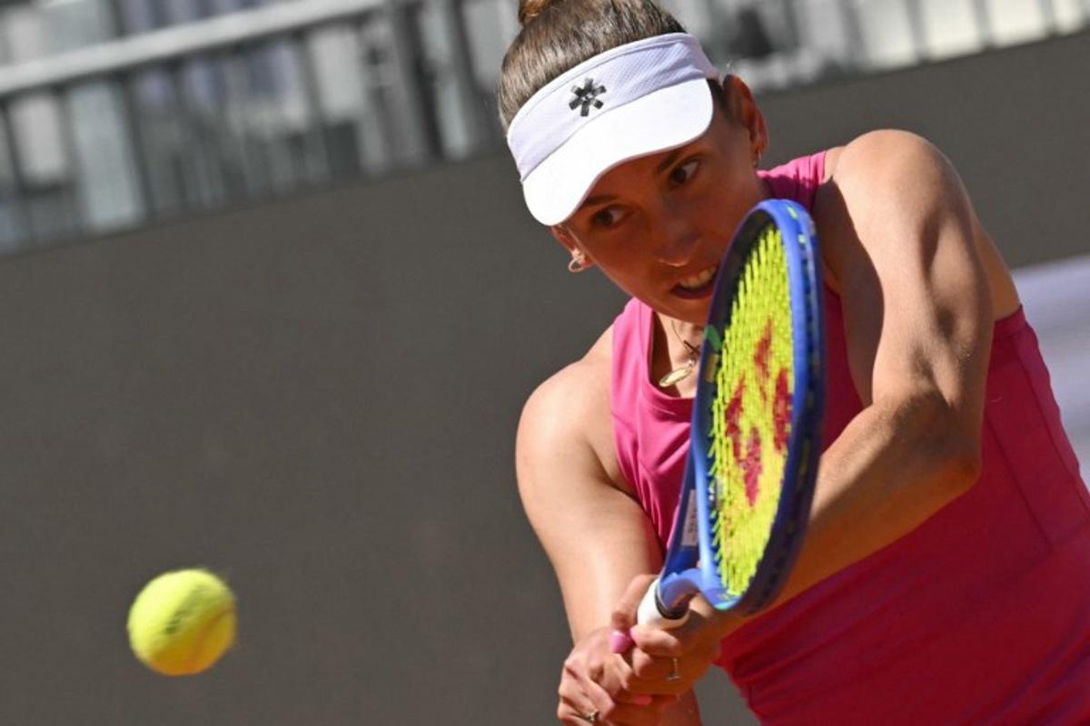 Belgium's Elise Mertens hits a return to Russia's Mira Andreeva during the WTA Rome Open tennis tournament at Foro Italico in Rome on May 11, 2026. Andreas SOLARO / AFP