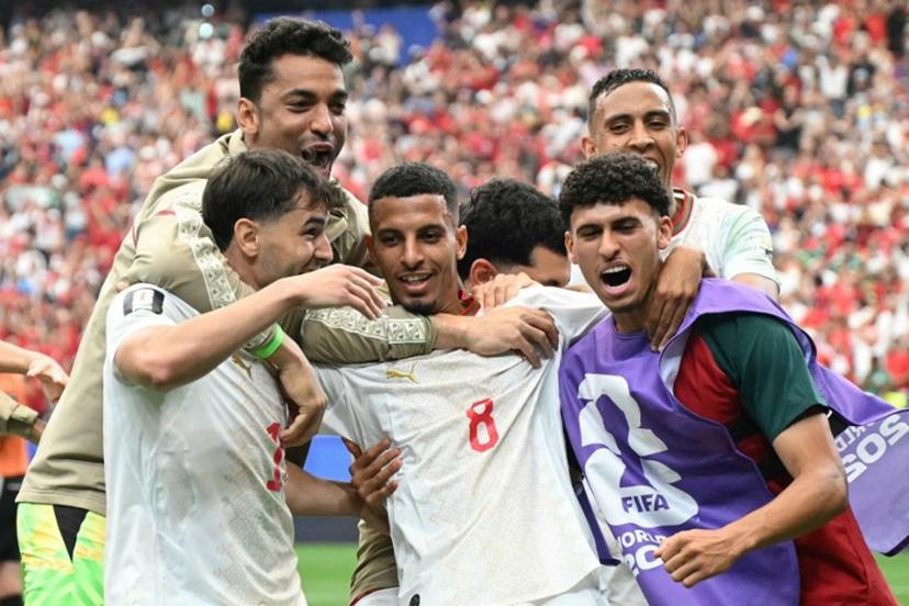 Morocco's midfielder #08 Azzedine Ounahi celebrates scoring his team's second goal with teammates during the 2026 World Cup round of 16 football match between Canada and Morocco at the Houston Stadium in Houston on July 4, 2026. RONALDO SCHEMIDT / AFP