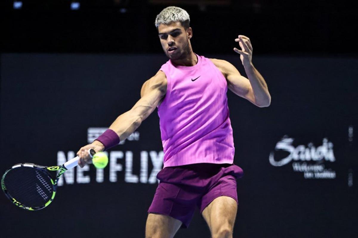 Spain's Carlos Alcaraz hits a return against Italy's Jannik Sinner during the final the Six Kings Slam exhibition tennis tournament in Riyadh on October 18, 2025. Fayez NURELDINE / AFP