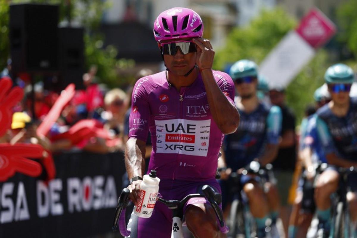 The best sprinter's cyclamen jersey UAE Team Emirates - XRG Ecuadorian rider Jhonatan Narvaez is pictured before the start of the 18th stage of the Giro d'Italia 2026 - Tour of Italy cycling race between Fai della Paganella and Pieve di Soligo, Italy, on May 28, 2026. Luca Bettini / AFP