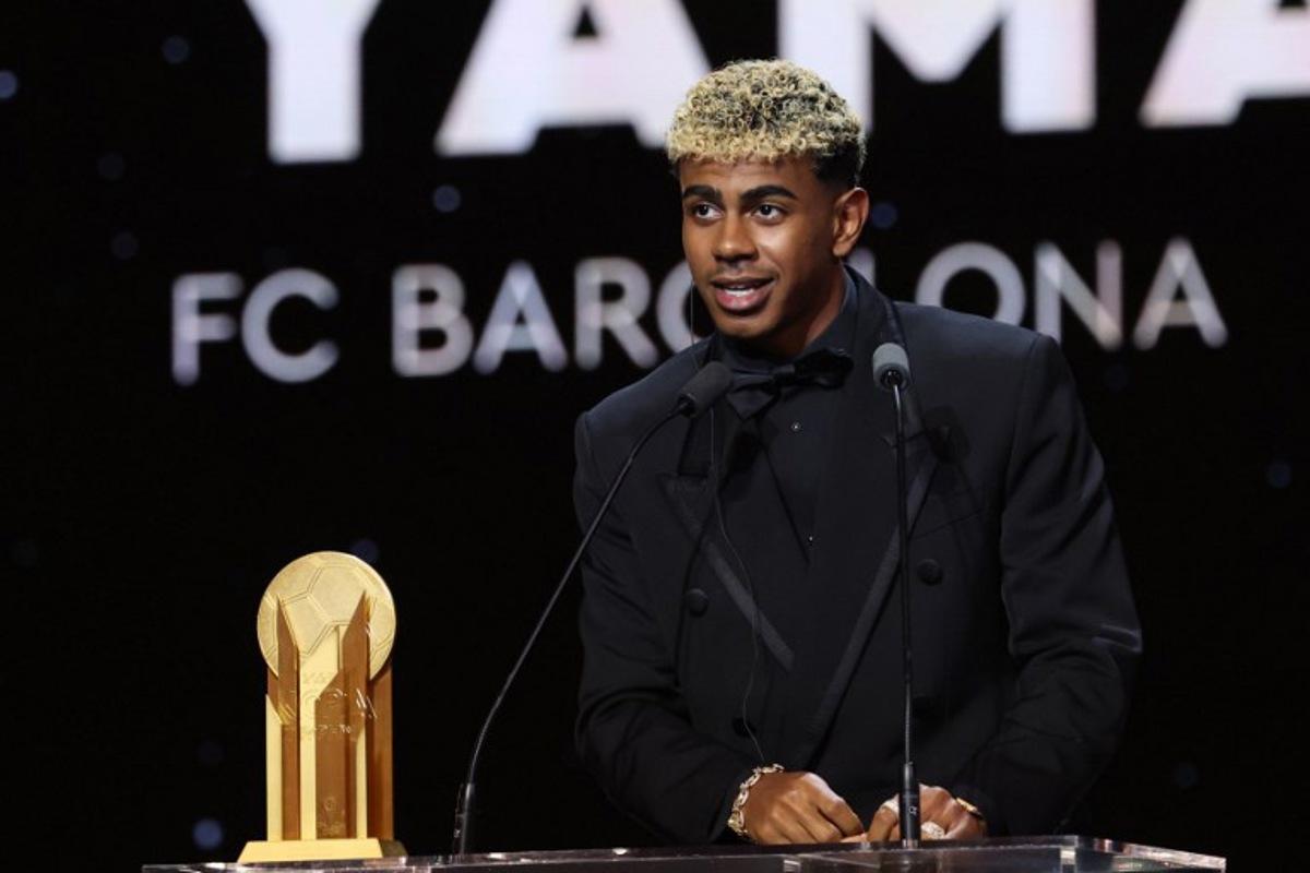 Barcelona's Spanish forward Lamine Yamal speaks after receiving the Kopa Trophy for the best under-21 player during the 2025 Ballon d'Or France Football award ceremony at the Theatre du Chatelet in Paris on September 22, 2025. Franck FIFE / AFP