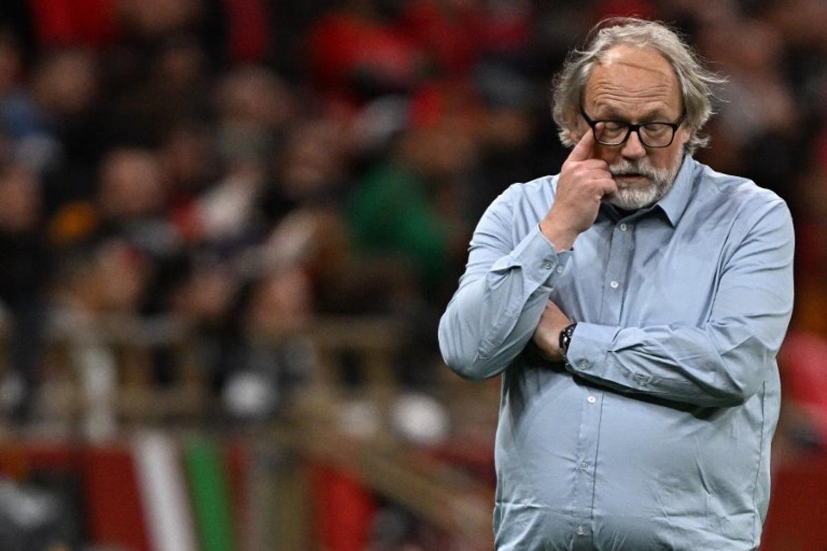 Mali's head coach Tom Saintfiet reacts after his team scored during the Africa Cup of Nations (CAN) Group A football match between Morocco and Mali at Prince Moulay Abdellah Stadium in Rabat on December 26, 2025. Gabriel BOUYS / AFP