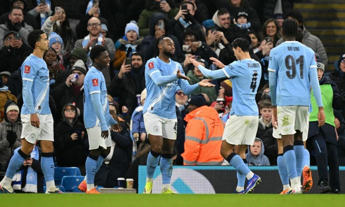 Manchester City's Ghanaian midfielder #42 Antoine Semenyo (C) celebrates scoring the team's sixth goal during the English FA Cup third round football match between Manchester City and Exeter City at the Etihad Stadium in Manchester, north west England, on January 10, 2026. Oli SCARFF / AFP