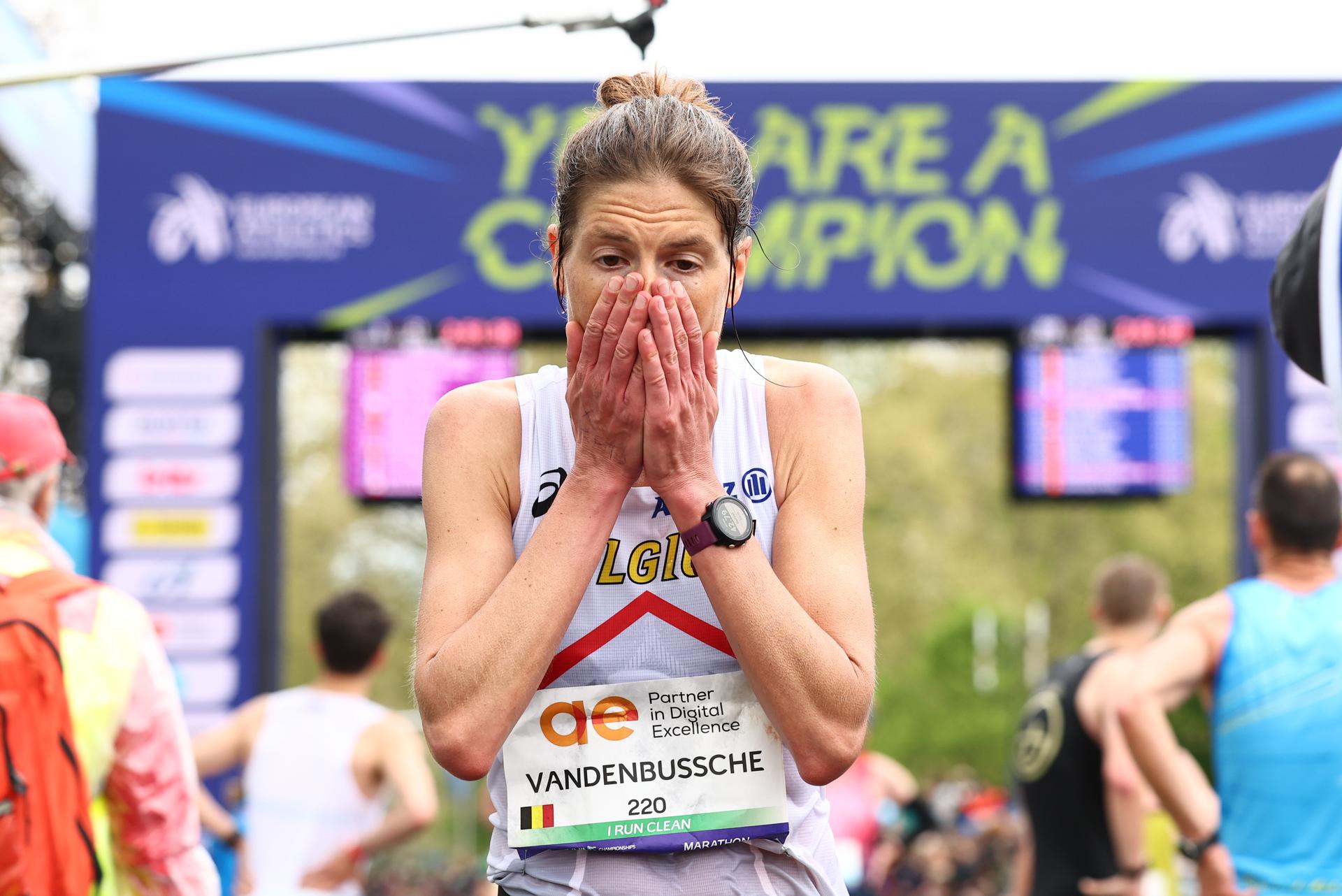 Belgian Hanna Vandenbussche reacts at the end of the women marathon race at European Running Championships, from Leuven to Brussels, Sunday 13 April 2025. BELGA PHOTO DAVID PINTENS