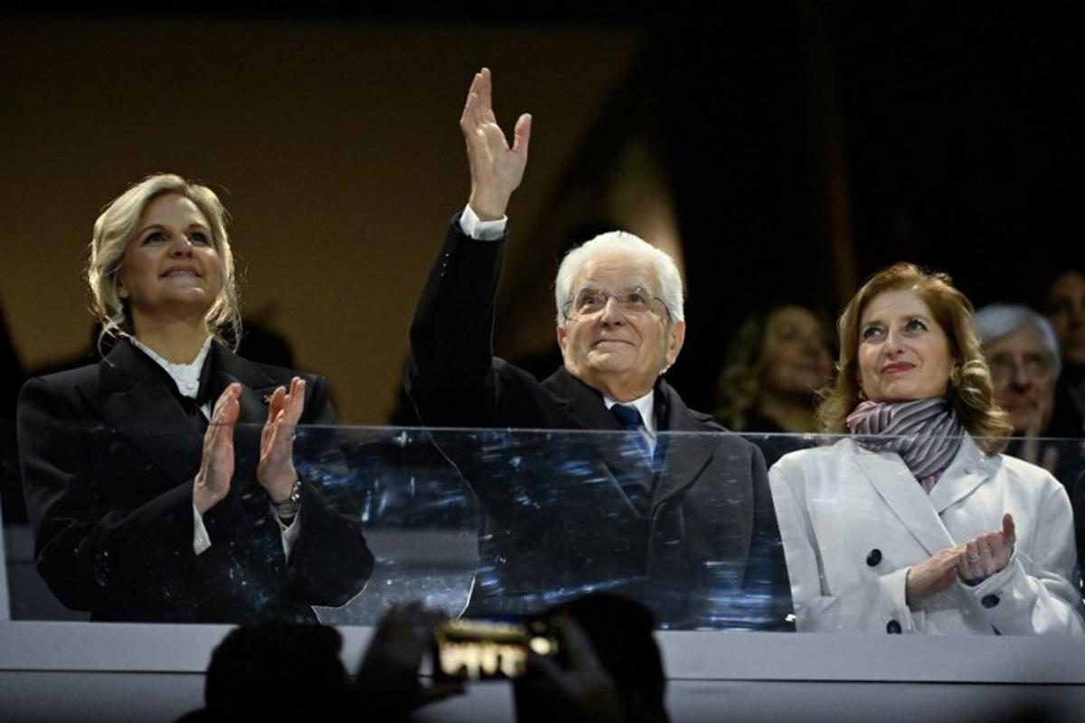 (From L) President of the International Olympic Committee (IOC) Kirsty Coventry, Italy's President Sergio Mattarella and his daughter Laura Mattarella attend the opening ceremony of the Milano Cortina 2026 Winter Olympic Games at the San Siro stadium in Milan, northern Italy, on February 6, 2026. WANG Zhao / AFP
