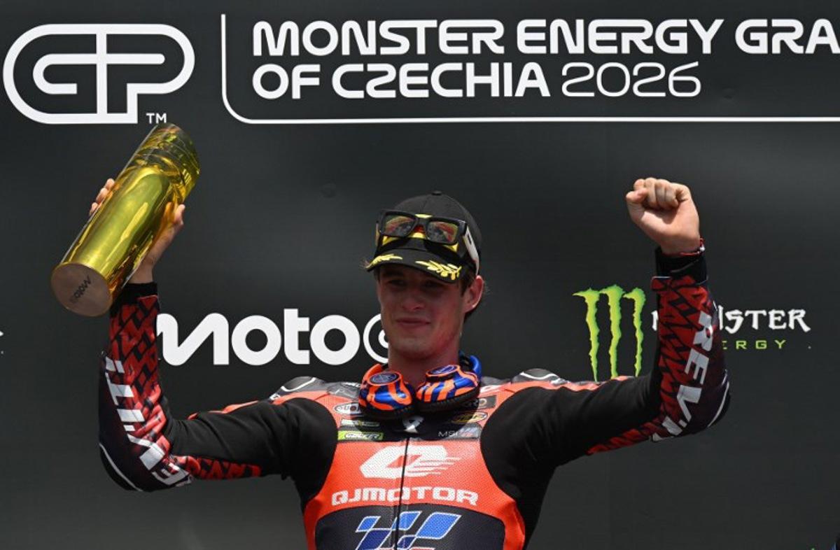 Team MT Helmets - MSi's Ivan Ortola celebrates on the podium after winning the Moto2 event prior to the MotoGP Grand Prix of Czechia in Brno, Czech Republic, on June 21, 2026. Michal Cizek / AFP