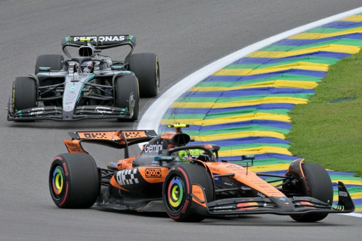 McLaren's British driver Lando Norris (Bottom) races in the lead ahead of Mercedes' Italian driver Kimi Antonelli (Top) during the sprint of the Sao Paulo Formula One Grand Prix at the Jose Carlos Pace racetrack, aka Interlagos, in Sao Paulo, Brazil on November 8, 2025. Nelson ALMEIDA / AFP