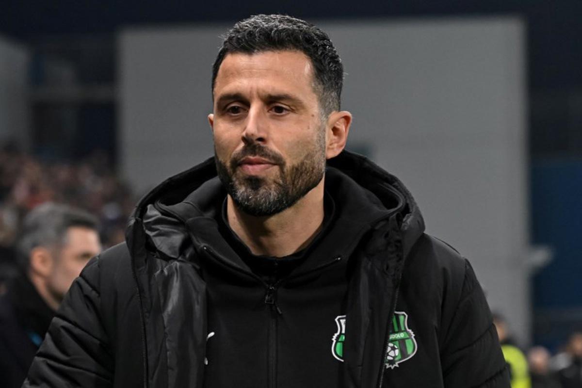 Sassuolo's Italian head coach, Fabio Grosso looks on ahead of the Italian Serie A football match between Sassuolo and Inter Milan at the Mapei Stadium in Reggio Emilia, Italy on February 8, 2026 Piero CRUCIATTI / AFP