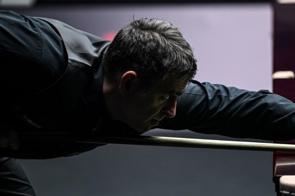Britain's Ronnie O'Sullivan plays a shot during his match against Chinese Zhou Jinhao at the Shanghai Masters snooker tournament in Shanghai on July 16, 2024. Hector RETAMAL / AFP
