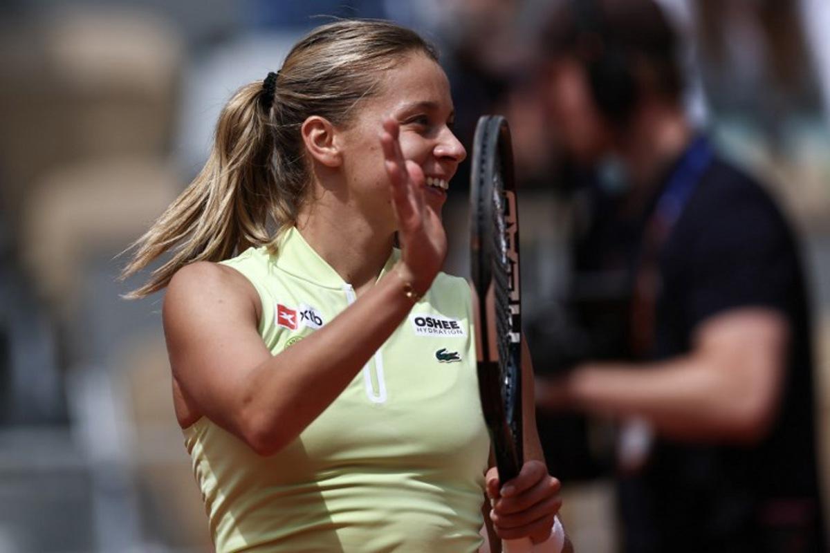 Winner Poland's Maja Chwalinska celebrates after winning against Anna Kalinskaya at the end of their women's quarter final singles match on day 11 of the French Open tennis tournament on Court Philippe-Chatrier at the Roland-Garros Complex in Paris on June 3, 2026. Anne-Christine POUJOULAT / AFP