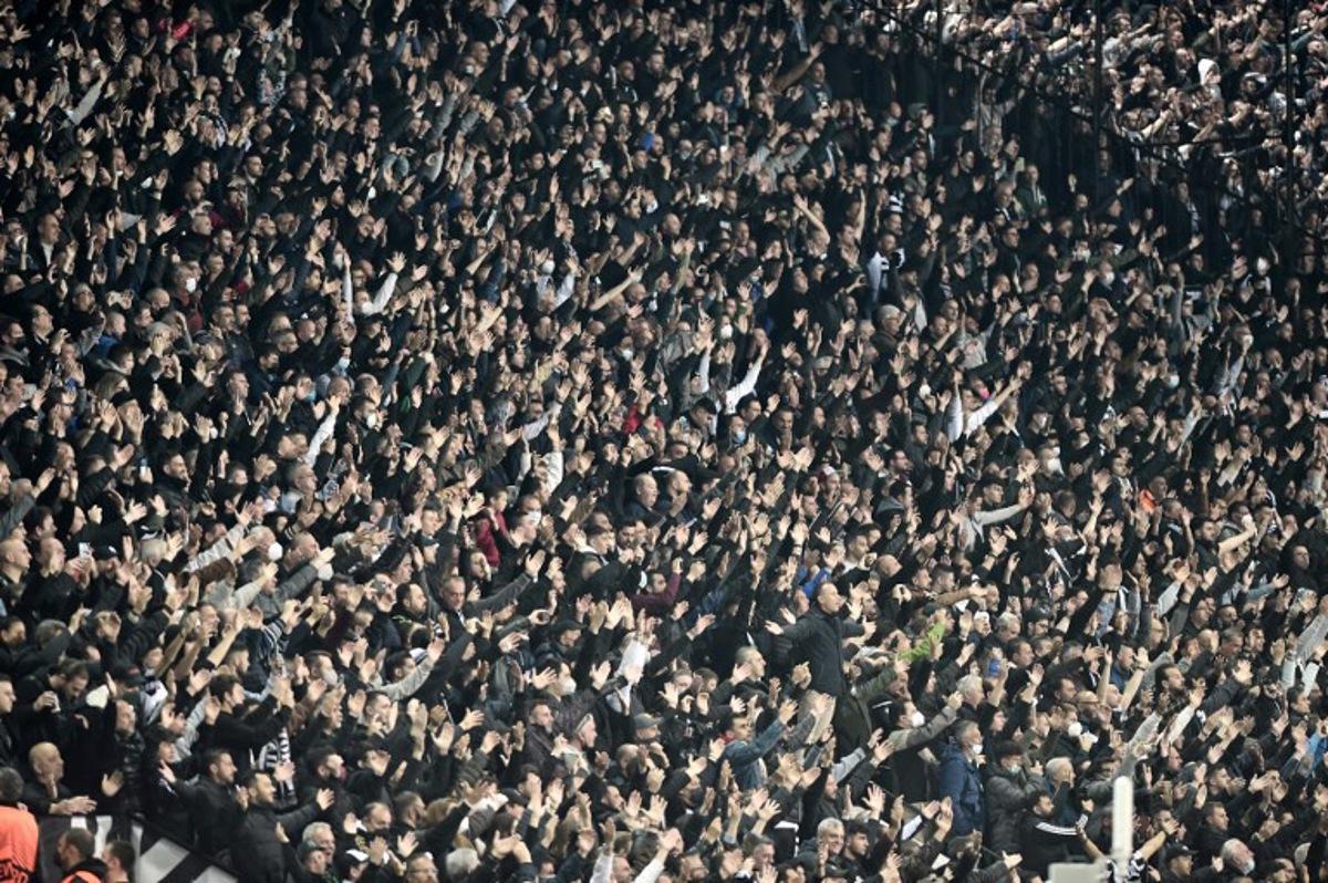 Paok's fans chant during the UEFA Europa Conference League quarter-final second leg football match between PAOK Thessaloniki and Olympique de Marseille (OM) at the Toumpa stadium in Thessaloniki on April 14, 2022. Sakis MITROLIDIS / AFP