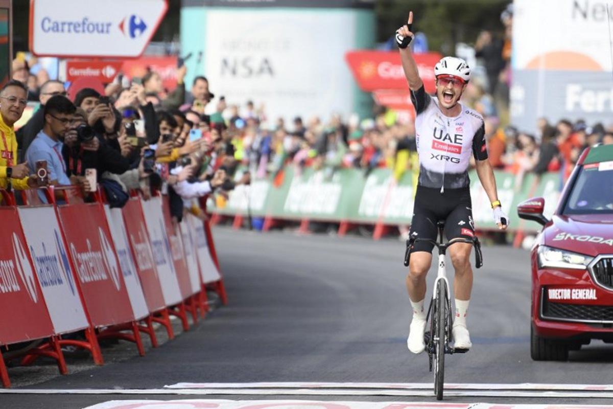 Team UAE's Australian rider Jay Vine celebrates winning the sixth stage of La Vuelta a Espana cycling tour, a 170 km race between Olot and Pal, in Andorra, on August 28, 2025. Josep LAGO / AFP