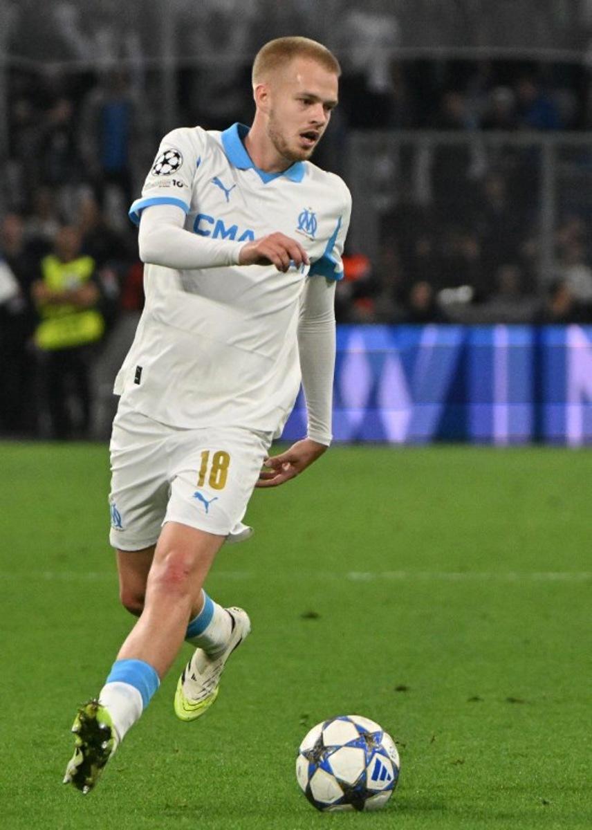 Marseille's Belgian midfielder #18 Arthur Vermeeren runs with the ball during the UEFA Champions League, league phase day 2, football match between Olympique de Marseille (FRA) and AFC Ajax (NED) at the Velodrome stadium, in Marseille on September 30, 2025. Christophe Simon / AFP