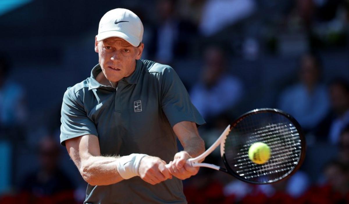 Italy's Jannik Sinner returns the ball to Denmark's Elmer Moller during their 2026 ATP Tour Madrid Open tennis tournament third round singles match at the Caja Magica in Madrid, on April 26, 2026. Thomas COEX / AFP