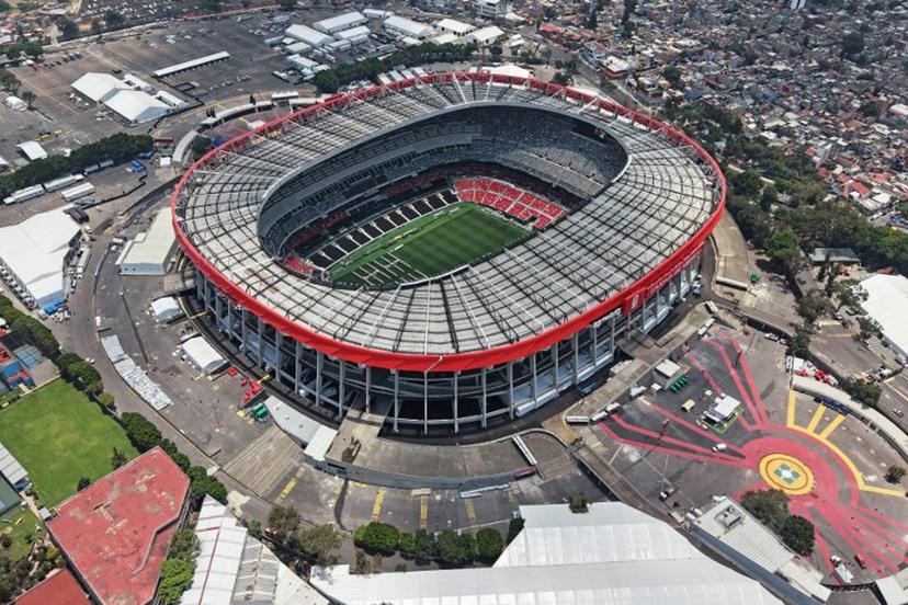 This aerial view shows the Mexico City Stadium, renamed from Azteca Stadium (or Banorte Stadium) for the FIFA World Cup, in Mexico City on May 28, 2026. FIFA temporarily branded the iconic Azteca Stadium as "Mexico City Stadium" for the 2026 World Cup, enforcing a strict "debranding" policy that requires all host stadiums to remove or cover non-official corporate sponsor names, suite branding, and external logos. Carl DE SOUZA / AFP
