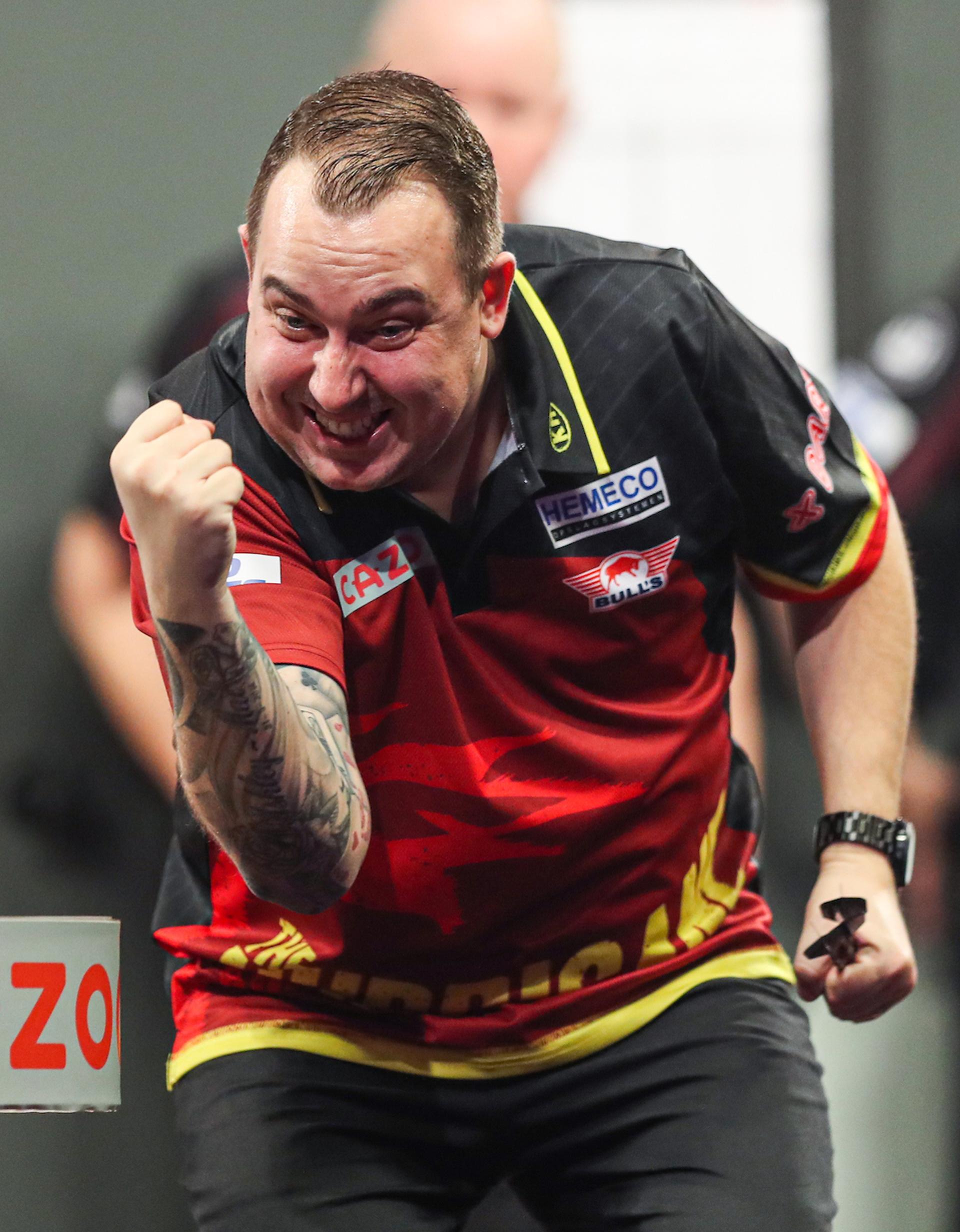 ATTENTION EDITORS - HAND OUT PICTURES - EDITORIAL USE WITH STORY ON DARTS WORLD CHAMPIONSHIPS ONLY - MANDATORY CREDIT KIERAN CLEEVES/PDC Hand out pictures released by PDC Professional Darts Corporation shows Belgian Kim Huybrechts celebrating after defeating Scottish Wright on day ten of the 2023 Cazoo World Darts Championship at Alexandra Palace, London, UK, on Tuesday 27 December 2022. MANDATORY CREDIT KIERAN CLEEVES/PDC
