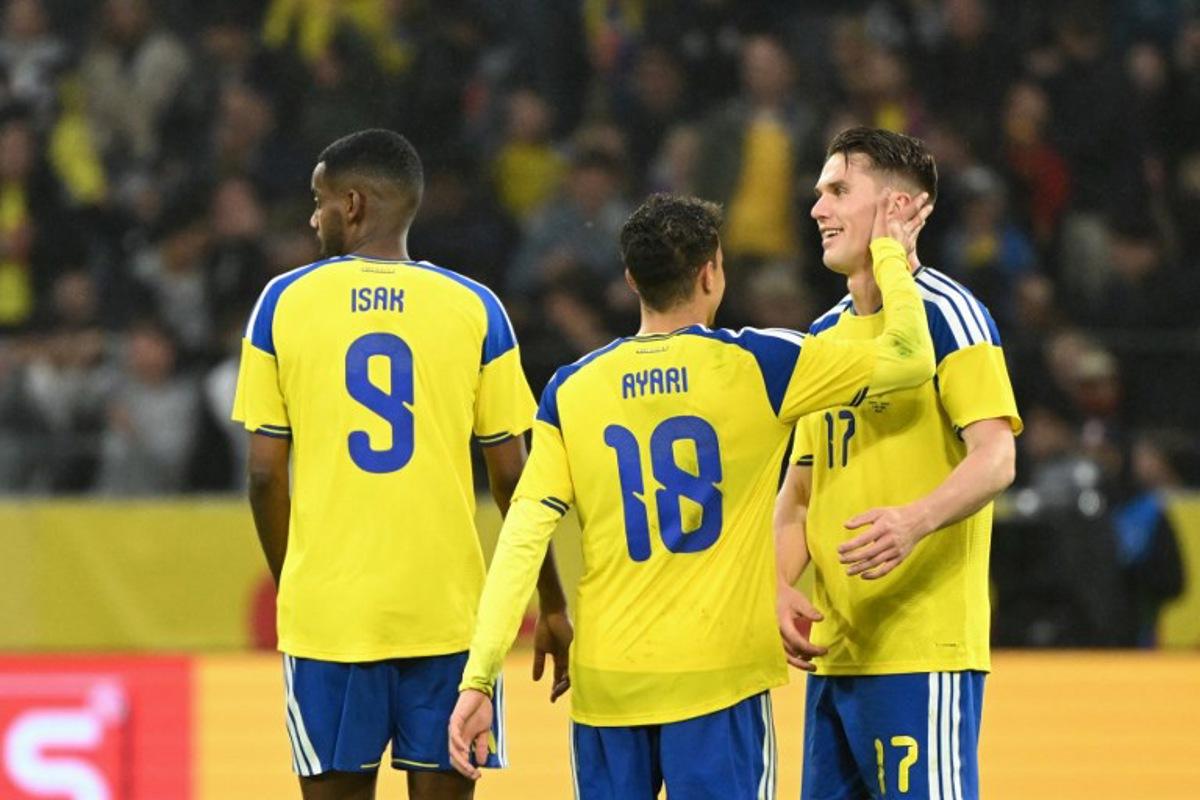 Sweden's forward #17 Viktor Gyokeres (R) celebrates scoring his team's first goal with teammates Sweden's midfielder #18 Yasin Abbas Ayari (C) and Sweden's forward #09 Alexander Isak during the friendly match between Sweden and Greece ahead of the 2026 FIFA World Cup football tournament, in Solna, near Stockholm, on June 4, 2026. Jonathan Nackstrand / AFP