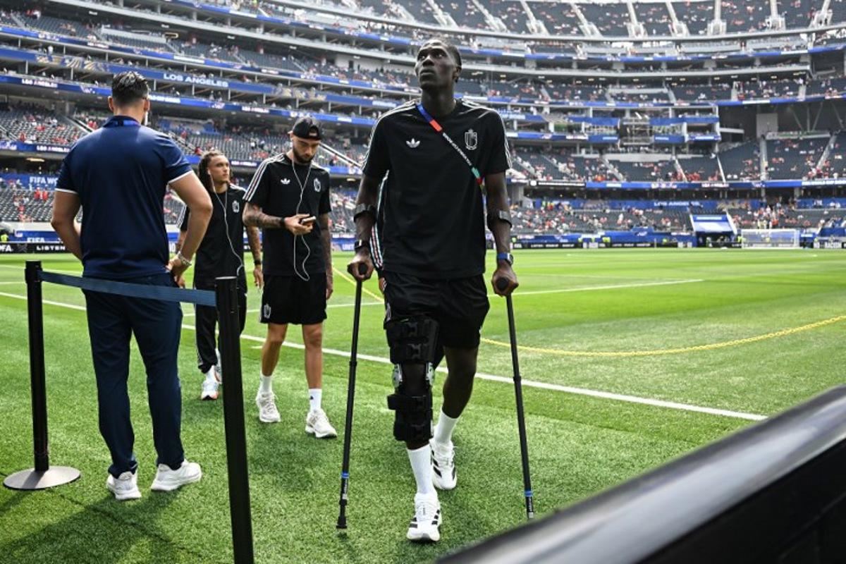Amadou Belgium's midfielder #24 Amadou Onana walks on the pitch ahead of the 2026 World Cup football tournament quarter-final match between Spain and Belgium at the Los Angeles Stadium in Inglewood on July 10, 2026. Paul ELLIS / AFP