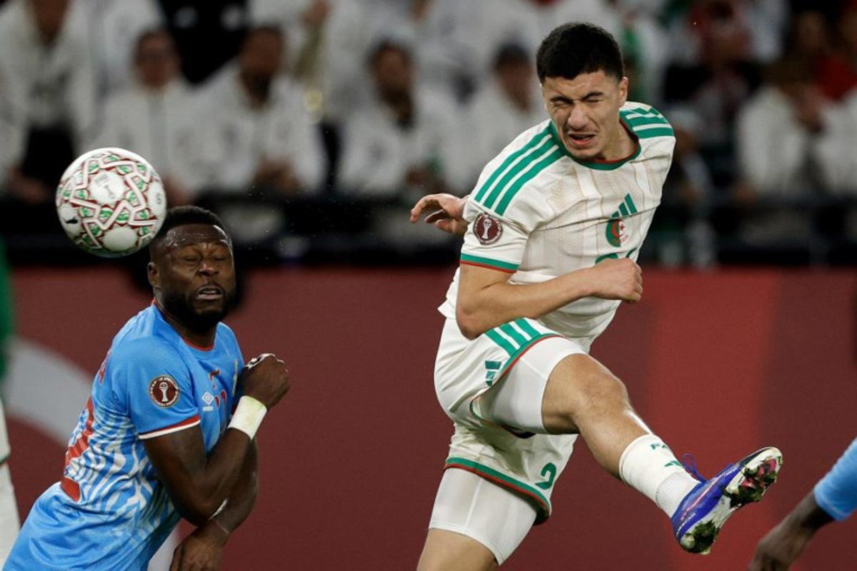 Algeria's midfielder #22 Ibrahim Maza heads the ball during the Africa Cup of Nations (CAN) round of 16 football match between Algeria and Democratic Republic of Congo at the Prince Moulay El Hassan Stadium in Rabat on January 6, 2026. Abdel Majid BZIOUAT / AFP