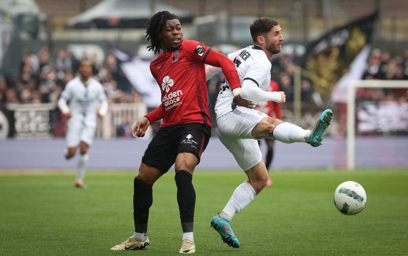 Rwdm's Tayo Adaramola and Charleroi's Antoine Bernier fight for the ball during a soccer match between RWD Molenbeek and Sporting Charleroi, Saturday 04 May 2024 in Charleroi, on day 5 of the 2023-2024 'Jupiler Pro League - Relegation Play-offs. BELGA PHOTO VIRGINIE LEFOUR