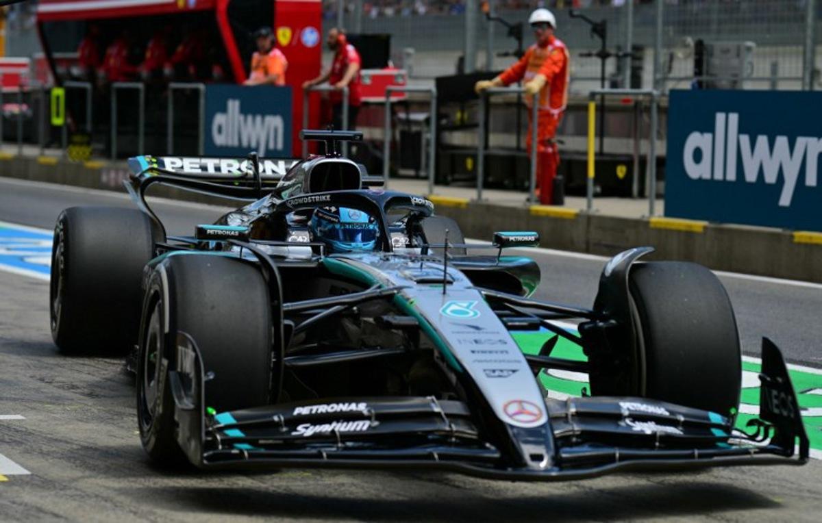 Mercedes' British driver George Russell drives to the start of the first practice session at the Red Bull Ring race track in Spielberg, Austria, on June 27, 2025, ahead of the Formula One Austrian Grand Prix. Andrej ISAKOVIC / AFP