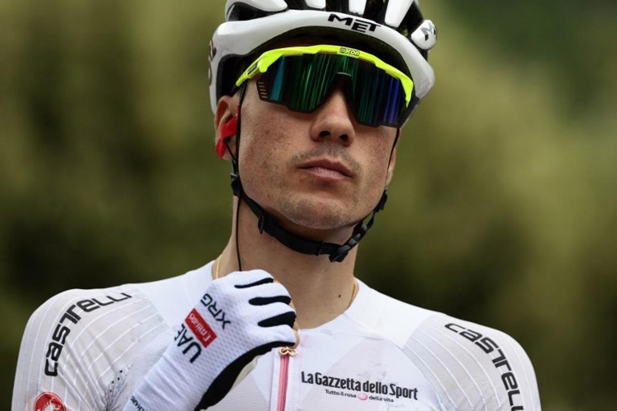 UAE Team Emirates XRG's Spanish rider Juan Ayuso waits for the start of the 9th stage of the 108th Giro d'Italia cycling race of 181kms from Gubbio to Siena on May 18, 2025. Luca Bettini / AFP