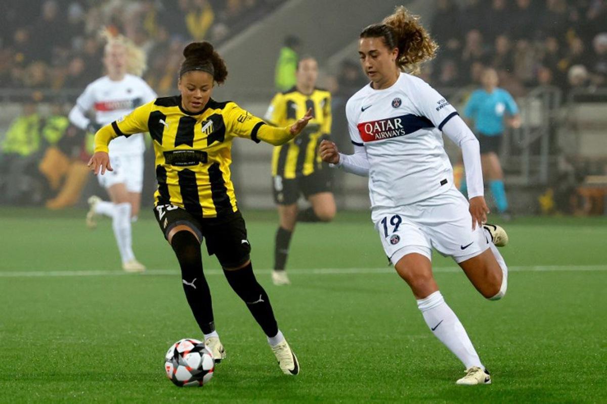 Hacken's Swedish midfielder #23 Felicia Schroder (L) and Paris Saint-Germain's American midfielder #19 Eva Gaetino vie for the ball during the UEFA Women's Champions League quarter-final, first-leg football match between Hacken and Paris Saint-Germain at Hisingen Arena, Gothenburg, Sweden on March 20, 2024. Adam IHSE / TT News Agency / AFP